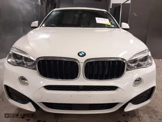 2019 BMW X6 sDrive35i with VIN 5UXKU0C5XK0S97686, listed as a IAAI auction lot 40436492 with 105,584 mi miles. Bid and sale history available at carsss.com. Image 6.