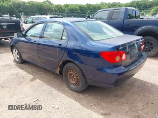 2006 Toyota Corolla CE with VIN JTDBR32E260059410, listed as a IAAI auction lot 42606319 with 243,756 mi miles and . Bid and sale history available at DreamBid. Image 3.