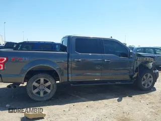 2020 Ford F-150 XL with VIN 1FTEW1E50LKE93170, listed as a IAAI auction lot 41918973 with 99,117 mi miles and . Bid and sale history available at carsss.com. Image 13.