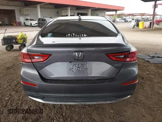 2020 Honda Insight Touring with VIN 19XZE4F94LE007115, listed as a IAAI auction lot 41819370 with 53,774 mi miles and . Bid and sale history available at carsss.com. Image 16.