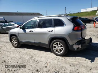 2014 Jeep Cherokee Latitude with VIN 1C4PJMCS0EW200588, listed as a Copart auction lot 54171255 with 196,247 mi miles and Salvage Title. Bid and sale history available at DreamBid. Image 2.