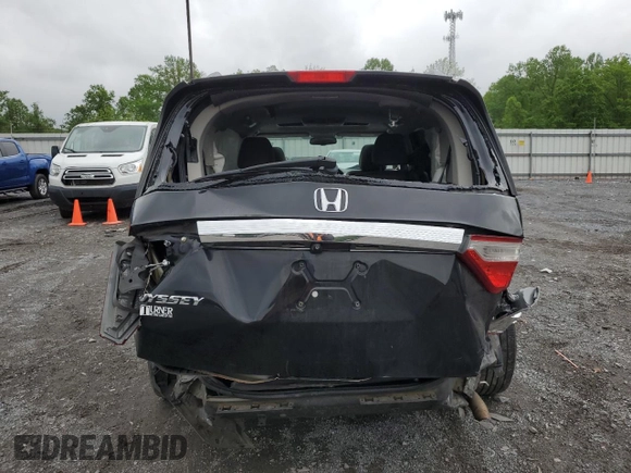 2013 Honda Odyssey EX-L with VIN 5FNRL5H69DB031498, listed as a Copart auction lot 55459745 with 129,773 mi miles and Salvage title. Bid and sale history available at DreamBid. Image 6.