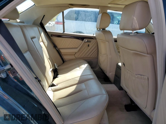 1997 Mercedes-Benz C with VIN WDBHA23EXVF507185, listed as a Copart auction lot 73716364 with 167,171 mi miles and Salvage title. Bid and sale history available at DreamBid. Image 10.