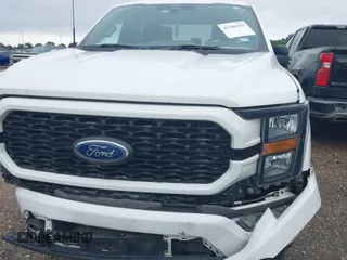 2023 Ford F-150 XL with VIN 1FTEW1CP0PKD52884, listed as a IAAI auction lot 41780292 with 60,103 mi miles and . Bid and sale history available at DreamBid. Image 12.