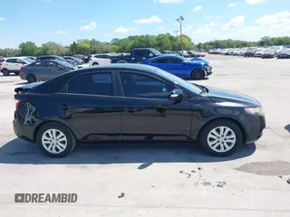 2010 Kia Forte EX with VIN KNAFU4A20A5847351, listed as a IAAI auction lot 41897921 with 129,084 mi miles. Bid and sale history available at carsss.com. Image 13.