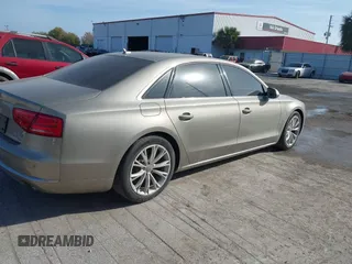 2012 Audi A8 z VIN WAURVAFD3CN024063, wystawiony jako IAAI lot #41706508 z przebiegiem Nie podano mil oraz . Historia ofert i sprzedaży dostępna na DreamBid. Obrazek 4.