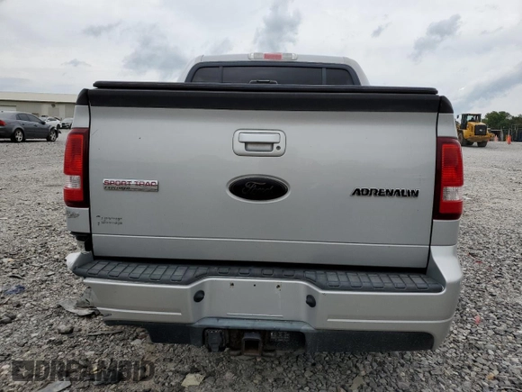 2010 Ford Explorer Sport Trac with VIN 1FMEU2D86AUA04257, listed as a Copart auction lot 60132315 with 116,941 mi miles and Salvage title. Bid and sale history available at DreamBid. Image 6.