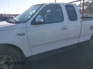 2000 Ford F-150 XL with VIN 1FTZX172XYNB36456, listed as a IAAI auction lot 41554603 with 239,766 mi miles. Bid and sale history available at carsss.com. Image 6.