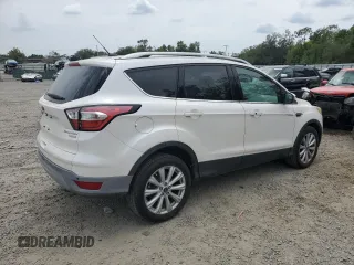 2017 Ford Escape Titanium with VIN 1FMCU0J93HUE01850, listed as a Copart auction lot 56075855 with 116,280 mi miles and Clean Title. Bid and sale history available at DreamBid. Image 3.
