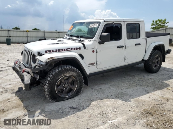 2021 Jeep Gladiator Rubicon z VIN 1C6JJTBG0ML624275, wystawiony jako Copart lot #62840275 z przebiegiem Nie podano mil oraz Szkoda całkowita • Salvage title. Historia ofert i sprzedaży dostępna na DreamBid. Obrazek 1.