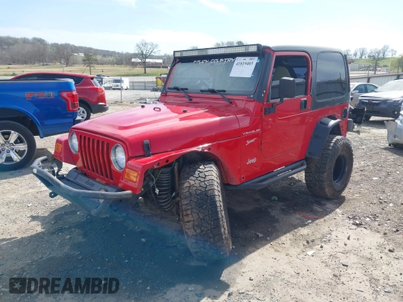 2002 Jeep Wrangler Sport with VIN 1J4FA49S42P771262, listed as a IAAI auction lot 41819403 with 132,871 mi miles. Bid and sale history available at carsss.com. Image 18.