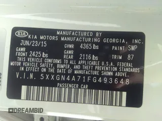 2015 Kia Optima EX with VIN 5XXGN4A71FG493648, listed as a IAAI auction lot 32483878 with Not provided miles and . Bid and sale history available at DreamBid. Image 9.
