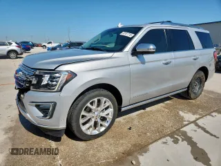 2019 Ford Expedition Platinum with VIN 1FMJU1MT4KEA65194, listed as a Copart auction lot 58161715 with 100,983 mi miles and Salvage title. Bid and sale history available at DreamBid. Image 1.