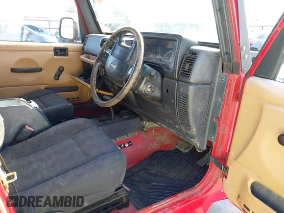 2004 Jeep Wrangler Sport Right Hand Drive with VIN 1J4F449S74P796957, listed as a IAAI auction lot 41987562 with 106,730 mi miles and . Bid and sale history available at carsss.com. Image 5.