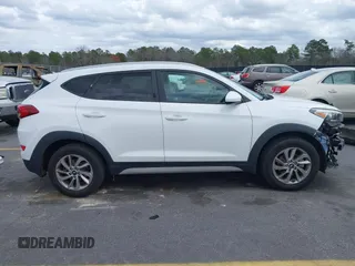 2017 Hyundai Tucson SE with VIN KM8J3CA44HU511581, listed as a IAAI auction lot 41687971 with 111,981 mi miles. Bid and sale history available at carsss.com. Image 14.