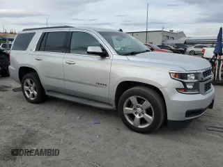 2015 Chevrolet Tahoe LT with VIN 1GNSCBKC2FR166597, listed as a Copart auction lot 50976505 with 155,069 mi miles and Salvage Title. Bid and sale history available at DreamBid. Image 4.