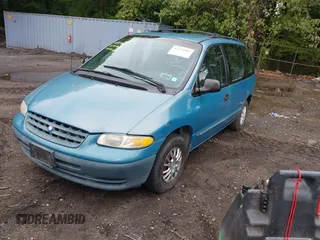 1998 Plymouth Voyager z VIN 2P4GP25R9WR797419, wystawiony jako IAAI lot #42324881 z przebiegiem 96 543 mil mil oraz . Historia ofert i sprzedaży dostępna na DreamBid. Obrazek 2.