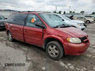 2005 Dodge Caravan SXT with VIN 2D4GP44L05R480918, listed as a Copart auction lot 58523645 with 212,535 mi miles and Salvage title. Bid and sale history available at DreamBid. Image 4.
