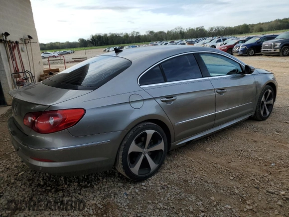 2010 Volkswagen CC Luxury z VIN WVWHP7AN9AE535737, wystawiony jako Copart lot #77401854 z przebiegiem 160 921 mil mil oraz Szkoda całkowita • Salvage title. Historia ofert i sprzedaży dostępna na DreamBid. Obrazek 3.