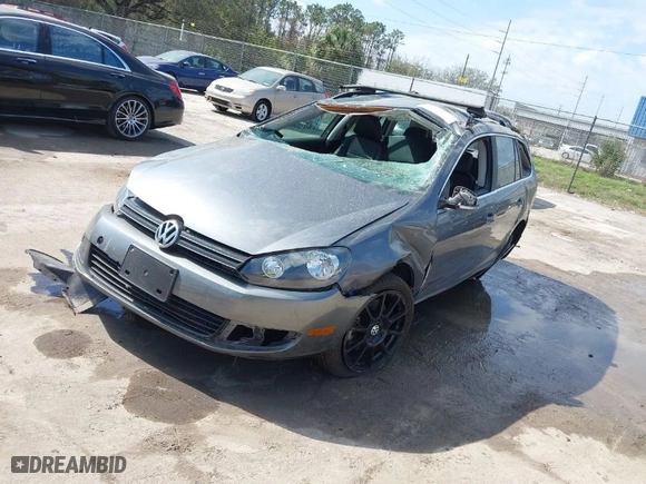 2014 Volkswagen Jetta SportWagen TDI w/Sunroof & Nav with VIN 3VWPL7AJ2EM602051, listed as a IAAI auction lot 41553277 with 114,981 mi miles. Bid and sale history available at carsss.com. Image 2.