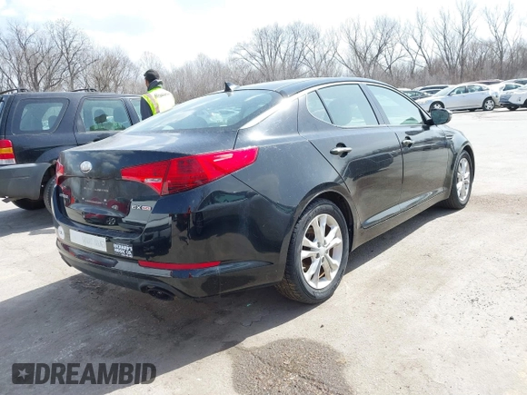 2013 Kia Optima EX z VIN 5XXGN4A7XDG198853, wystawiony jako IAAI lot #41807485 z przebiegiem 87 466 mil mil oraz . Historia ofert i sprzedaży dostępna na DreamBid. Obrazek 4.