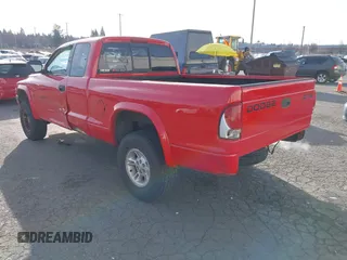 1999 Dodge Dakota SLT with VIN 1B7GG22XXXS290116, listed as a IAAI auction lot 41372636 with 132,112 mi miles and . Bid and sale history available at carsss.com. Image 3.