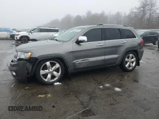 2013 Jeep Grand Cherokee Overland with VIN 1C4RJFCTXDC555233, listed as a Copart auction lot 44535045 with 104,721 mi miles and Clean Title. Bid and sale history available at carsss.com. Image 1.