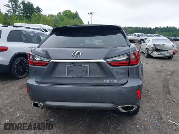 2016 Lexus RX 350 z VIN 2T2BZMCA1GC001812, wystawiony jako IAAI lot #42278639 z przebiegiem 69 648 mil mil oraz . Historia ofert i sprzedaży dostępna na DreamBid. Obrazek 17.