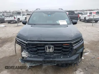 2023 Honda Pilot TrailSport with VIN 5FNYG1H63PB051646, listed as a IAAI auction lot 41069614 with 28,730 mi miles. Bid and sale history available at carsss.com. Image 12.