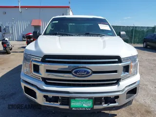 2020 Ford F-150 XL with VIN 1FTFW1E58LKE46828, listed as a IAAI auction lot 42692281 with 180,823 mi miles and . Bid and sale history available at DreamBid. Image 6.