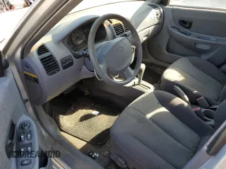 2005 Hyundai Accent GLS with VIN KMHCG45C75U638812, listed as a Copart auction lot 77968234 with 130,815 mi miles and Salvage Title. Bid and sale history available at carsss.com. Image 8.