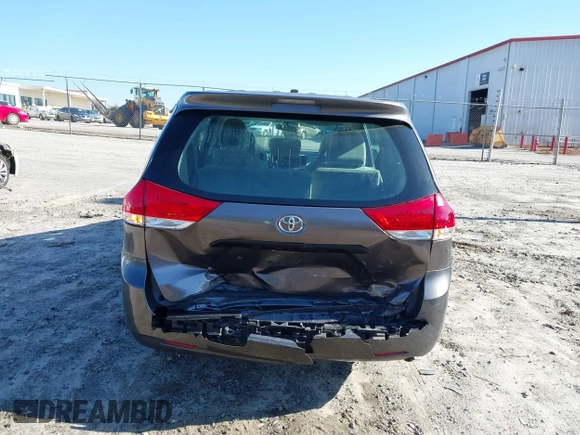 2014 Toyota Sienna L with VIN 5TDZK3DC3ES506658, listed as a IAAI auction lot 41469391 with 169,848 mi miles. Bid and sale history available at carsss.com. Image 6.