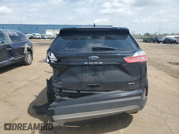 2022 Ford Edge SEL z VIN 2FMPK4J97NBA83621, wystawiony jako Copart lot #54874805 z przebiegiem 72 892 mil mil oraz Nie do naprawy • Non repairable. Historia ofert i sprzedaży dostępna na DreamBid. Obrazek 6.