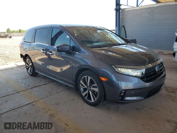 2021 Honda Odyssey Touring with VIN 5FNRL6H88MB040703, listed as a Copart auction lot 60340095 with 66,171 mi miles and Salvage title. Bid and sale history available at DreamBid. Image 4.