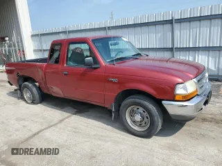 1999 Ford Ranger XL with VIN 1FTYR14V2XPB56627, listed as a Copart auction lot 57036435 with 215,050 mi miles and Salvage title. Bid and sale history available at DreamBid. Image 4.
