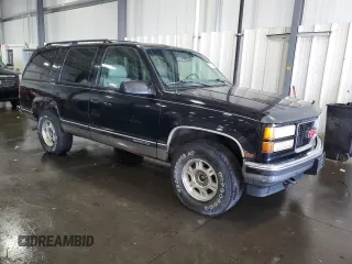 1996 GMC Yukon with VIN 1GKEK13R7TJ745251, listed as a Copart auction lot 71186194 with 222,912 mi miles and Clean Title. Bid and sale history available at carsss.com. Image 4.