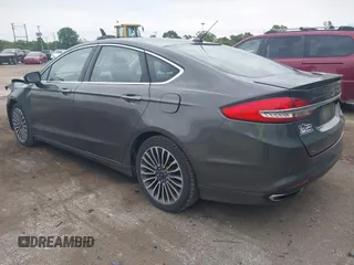 2017 Ford Fusion Titanium with VIN 3FA6P0K96HR208757, listed as a IAAI auction lot 42400172 with 90,000 mi miles and . Bid and sale history available at DreamBid. Image 3.