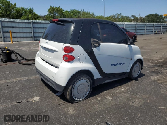2014 Smart fortwo Pure with VIN WMEEJ3BAXEK778748, listed as a Copart auction lot 57611955 with 59,895 mi miles and Clean title. Bid and sale history available at DreamBid. Image 3.