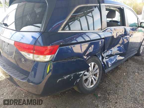 2014 Honda Odyssey EX-L with VIN 5FNRL5H66EB080708, listed as a IAAI auction lot 42067390 with 175,916 mi miles and . Bid and sale history available at carsss.com. Image 4.