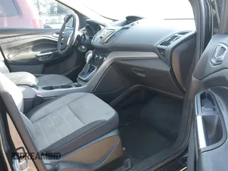 2014 Ford Escape SE with VIN 1FMCU9G9XEUB01861, listed as a IAAI auction lot 42096150 with 141,853 mi miles. Bid and sale history available at carsss.com. Image 5.