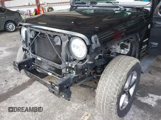 2019 Jeep Wrangler Unlimited Sahara with VIN 1C4HJXEG5KW532861, listed as a IAAI auction lot 41698912 with 121,278 mi miles and . Bid and sale history available at DreamBid. Image 6.