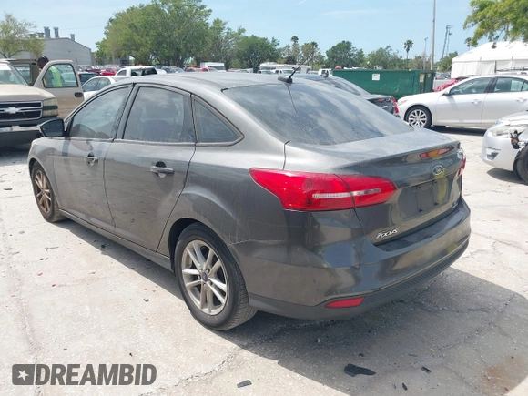 2016 Ford Focus SE with VIN 1FADP3F27GL264452, listed as a IAAI auction lot 41842240 with 180,261 mi miles. Bid and sale history available at carsss.com. Image 3.