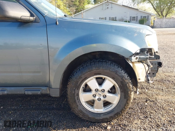 2012 Ford Escape XLT with VIN 1FMCU9D77CKB63827, listed as a IAAI auction lot 42044393 with 231,933 mi miles and . Bid and sale history available at DreamBid. Image 19.