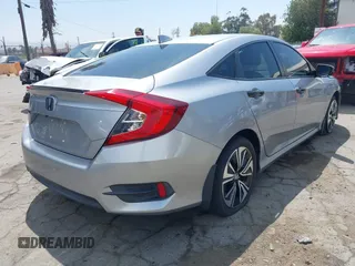 2018 Honda Civic EX-L z VIN JHMFC1F79JX037843, wystawiony jako IAAI lot #42121623 z przebiegiem 49 759 mil mil oraz . Historia ofert i sprzedaży dostępna na DreamBid. Obrazek 4.