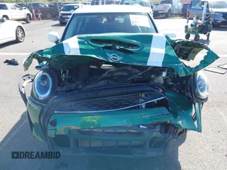2022 MINI Hardtop 4 Door Cooper S z VIN WMW53DK0XN2R31678, wystawiony jako IAAI lot #41859367 z przebiegiem Nie podano mil oraz . Historia ofert i sprzedaży dostępna na DreamBid. Obrazek 13.