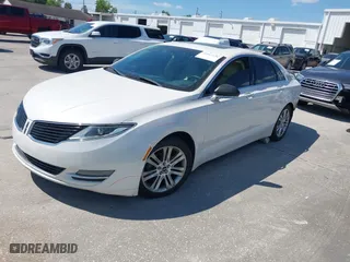 2014 Lincoln MKZ Hybrid with VIN 3LN6L2LU3ER819681, listed as a IAAI auction lot 41867338 with 149,964 mi miles. Bid and sale history available at carsss.com. Image 2.