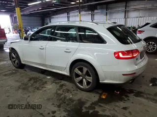 2014 Audi allroad Premium Plus with VIN WA1UFAFL9EA066453, listed as a Copart auction lot 87761015 with 100,193 mi miles and Salvage Title. Bid and sale history available at carsss.com. Image 2.