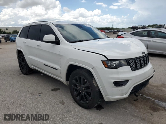 2019 Jeep Grand Cherokee Laredo E with VIN 1C4RJEAG4KC816725, listed as a Copart auction lot 64466815 with 84,763 mi miles and Salvage title. Bid and sale history available at DreamBid. Image 4.