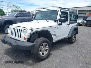 2013 Jeep Wrangler Sport with VIN 1C4AJWAG6DL626429, listed as a IAAI auction lot 42348347 with 120,104 mi miles and . Bid and sale history available at DreamBid. Image 2.