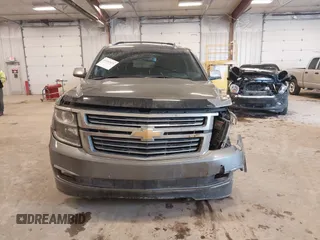 2019 Chevrolet Suburban Premier with VIN 1GNSKJKC1KR291629, listed as a IAAI auction lot 41565675 with 129,672 mi miles and . Bid and sale history available at DreamBid. Image 12.